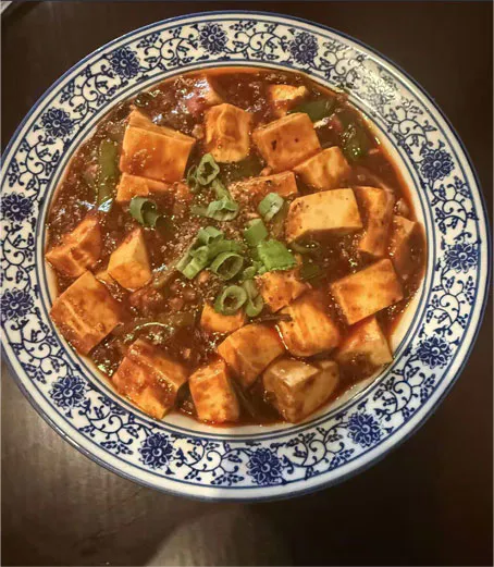 Mapo tofu with silken tofu cubes in spicy Sichuan sauce and scallions at ShangWei Szechuan, a Chinese Restaurant in Bethlehem